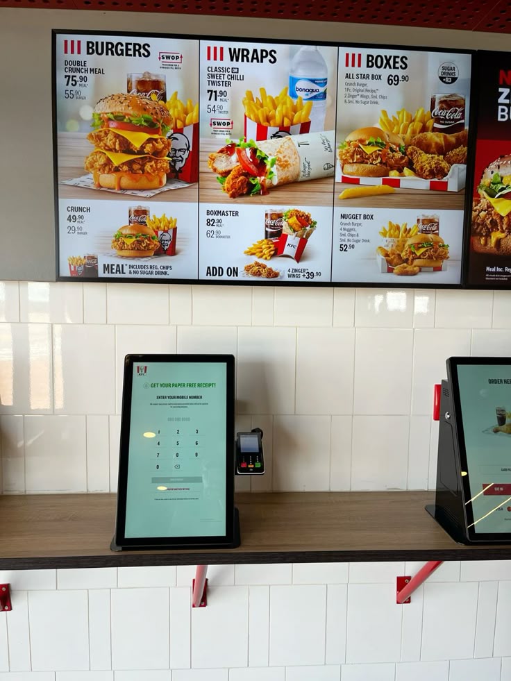 Self-order kiosks and digital menu board with combo meals and priced add-ons