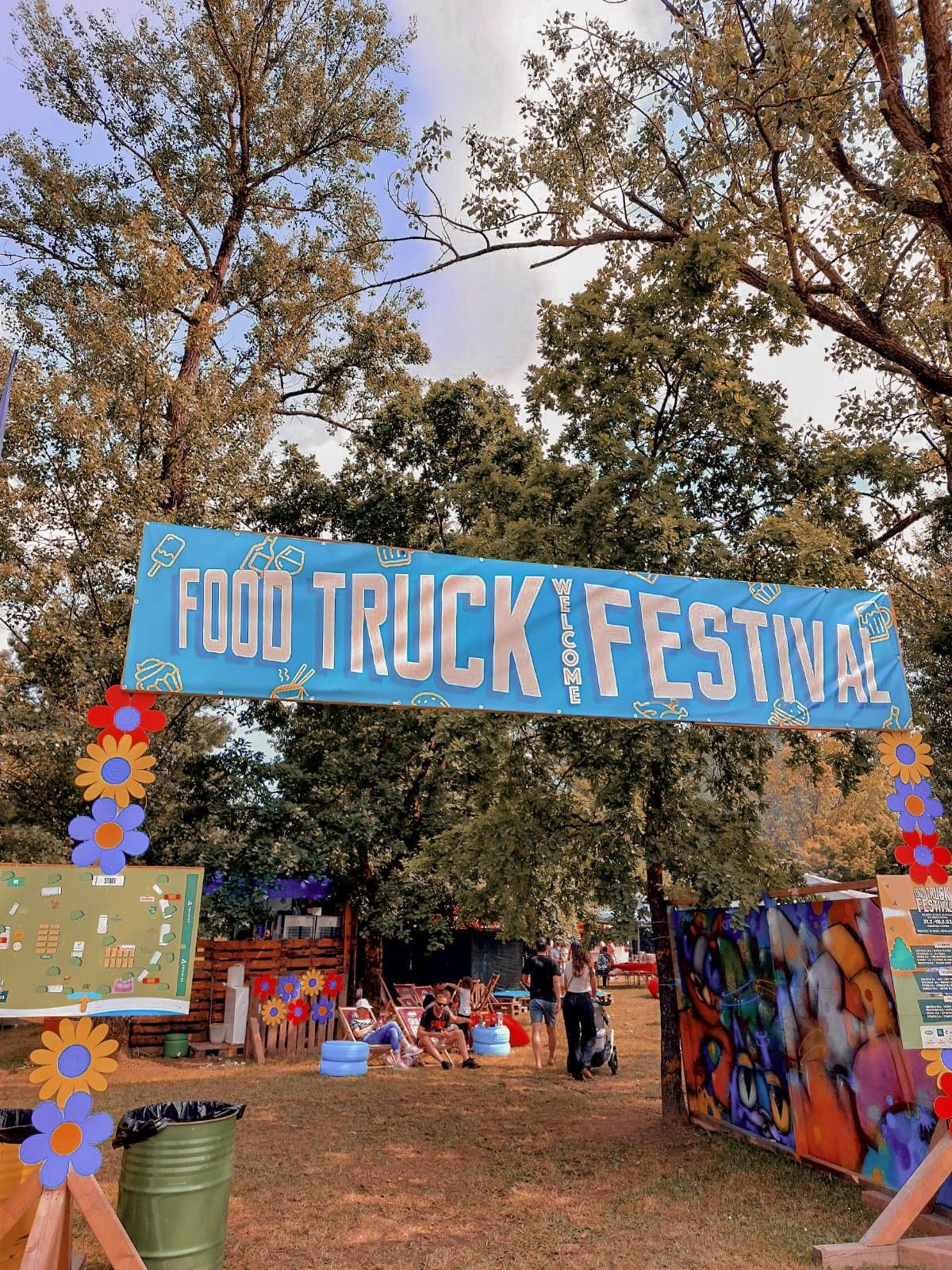Food trucks at a busy outdoor festival