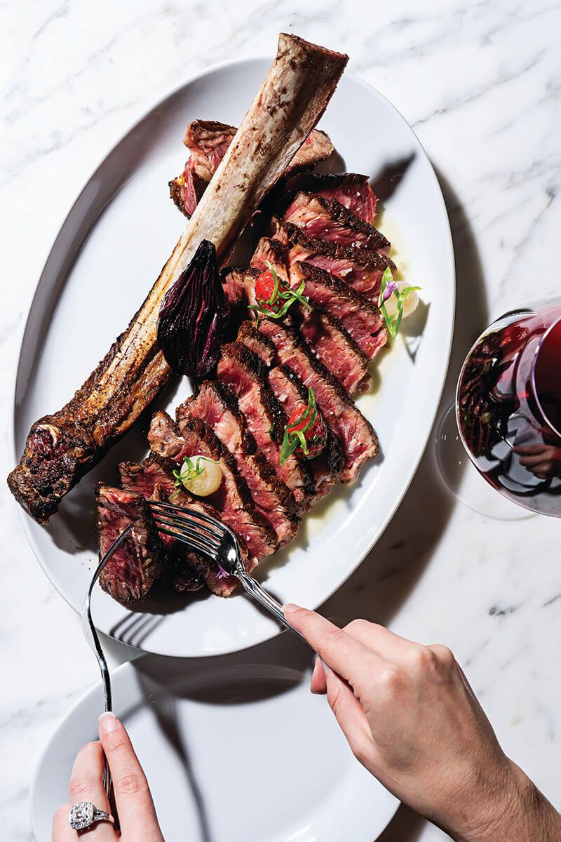 Smoked ribs and sides from a food truck menu