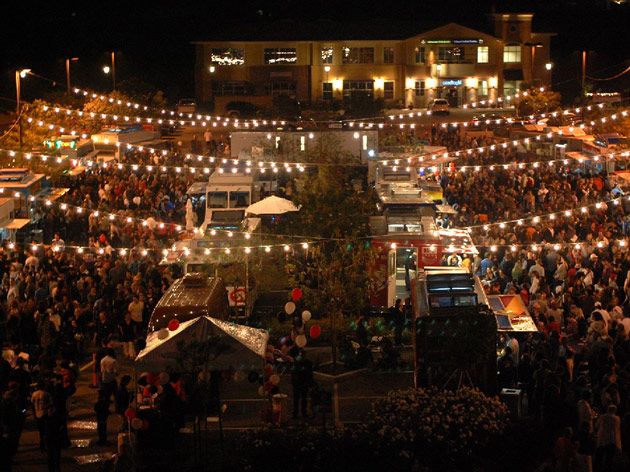 Food truck at festival with customers ready to turn them into repeat delivery orders